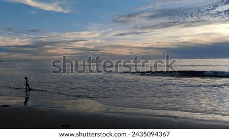 Sunset scenes along the shore at Swamis Reef Surf Park Encinitas California.