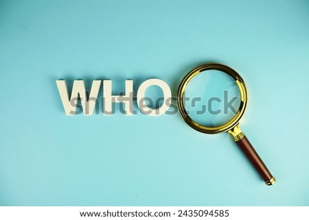 WHO alphabet letters with magnifying glass on blue background