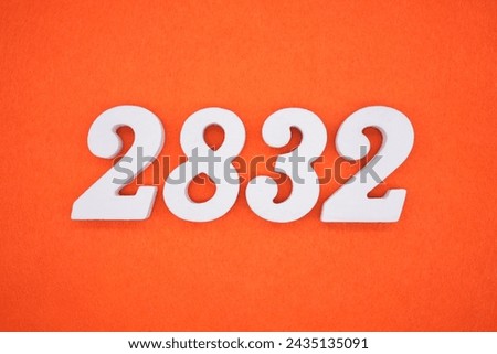 Orange felt is the background. The numbers 2832 are made from white painted wood.
