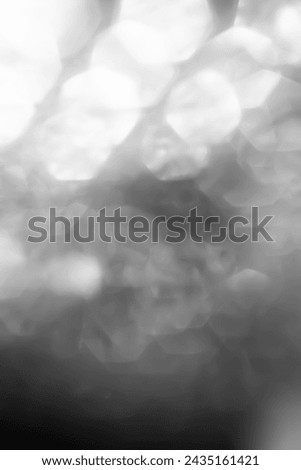 Blurred shiny texture. Abstract background. Glaring surface. Defocused macro image