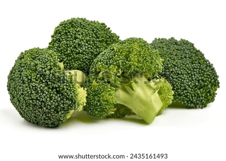 Fresh green broccoli, isolated on white background. High resolution image Royalty-Free Stock Photo #2435161493