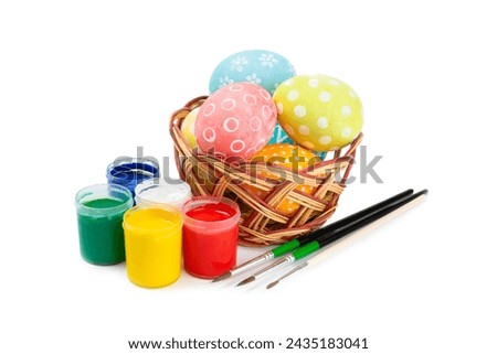 Easter egg painting isolated on white background.Happy Easter celebration concept.Colorful Easter eggs with different patterns.Paints,decorations for coloring eggs for holiday.Creative background.
