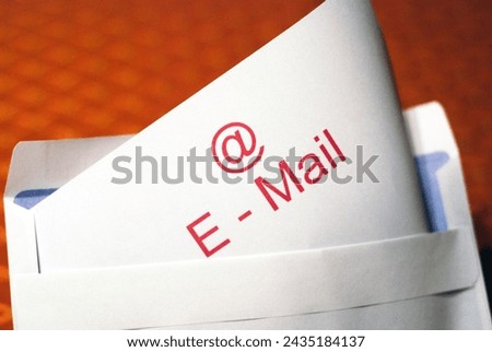 Concept photo of an envelope with e-mail characters