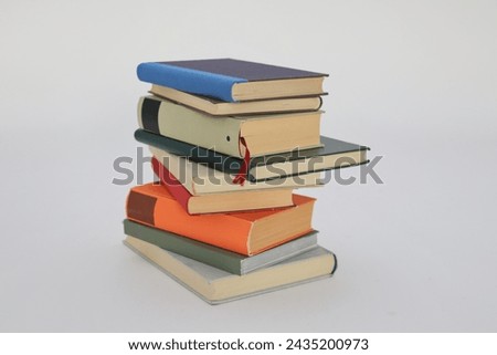 Isolated books on a white background, a set of books by the world's best writers, photo illustration for literature, science, science, learning, studying, history, education
