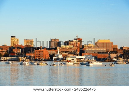 Portland, Maine, USA coastal skyline in the morning.