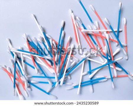 Colorful stick of cotton swab in pile on the white background. life style, care for life. 