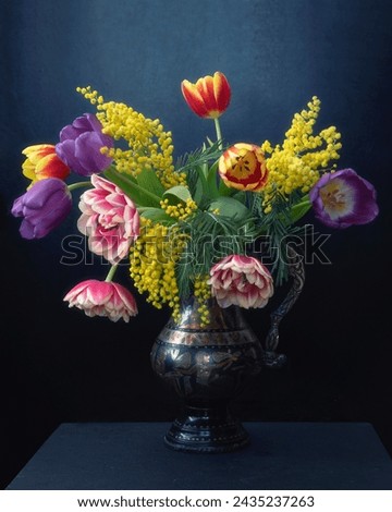 Bouquet of spring flowers on a black background
