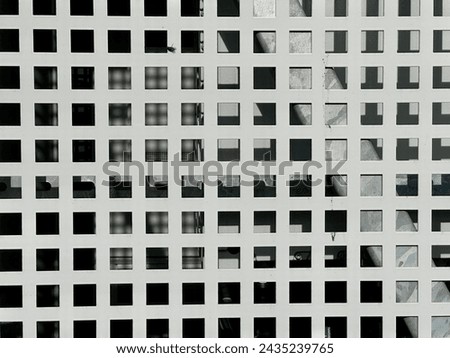 Grey metallic pattern fence background  Royalty-Free Stock Photo #2435239765