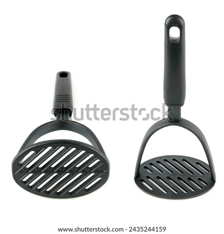 Kitchen utensils, potato masher isolated on white background. Collage. There is free space for text. Royalty-Free Stock Photo #2435244159
