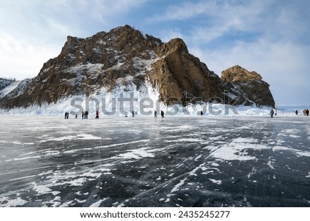 Coast of lake Baikal in winter, the deepest and largest freshwater lake by volume in the world, located in southern Siberia, Russia Royalty-Free Stock Photo #2435245277