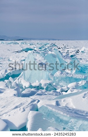 Hummocks on Lake Baikal, the deepest and largest freshwater lake by volume in the world, located in southern Siberia, Russia Royalty-Free Stock Photo #2435245283