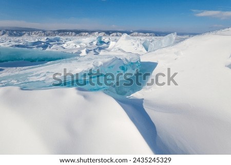 Hummocks on Lake Baikal, the deepest and largest freshwater lake by volume in the world, located in southern Siberia, Russia Royalty-Free Stock Photo #2435245329