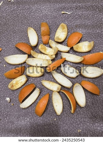 A beautiful picture of orange peels in a group shape 
