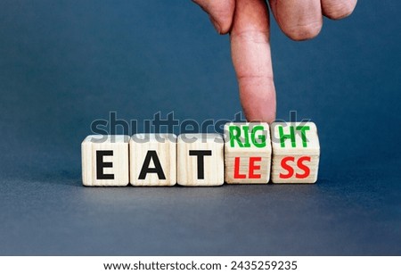 Eat less or right symbol. Concept words Eat less or Eat right on wooden cubes. Beautiful grey table grey background. Doctor hand. Healthy lifestyle and eat less or right concept. Copy space. Royalty-Free Stock Photo #2435259235