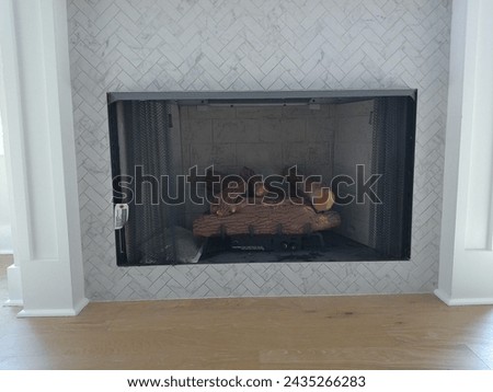 Gas log fireplace in a new townhouse.