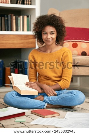 Portrait, smile and happy student in home library, floor and studying for exam. Education, test and learning for university female scholar in London, knowledge and literacy with textbooks for notes
