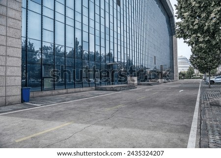 Modern Architectural Detail of Reflective Glass Building Facade