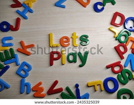 Colorful Alphabet with word lets play 