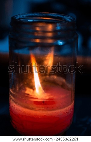 wonderful dancing flame , in the jar bottle, glass, warm and cold, candle, conceptual arts