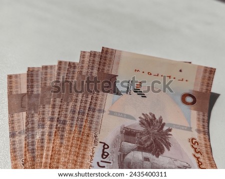 Currency note, UAE Emirates currency aed Dirham, Closeup of UAE dirhams currency notes, paper money 5 aed dirham. 
Photo Formats