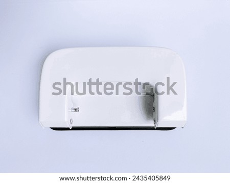 White office hole punch in the white background