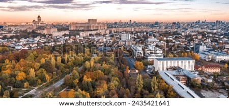 Aerial view with Palace of Parliament and the Cathedral in Bucharest Romania with autumn colors