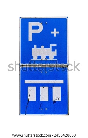 Worn railway station parking lot sign isolated in white background, clipping path