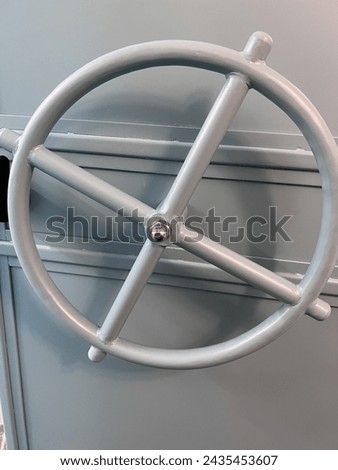 Metal knob to open the hatch on a ship, opening the door on warships, closed hatch, no passage, no entry allowed, interior of a warship, Metal knob, Hatch, Ship, Warship, Door, Closed hatch, No pass