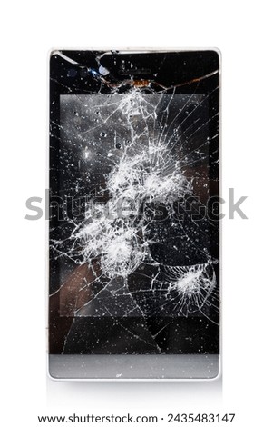 Broken smartphone with cracked display