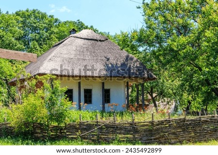 Ancient traditional ukrainian rural house in Pyrohiv (Pirogovo) village near Kiev, Ukraine Royalty-Free Stock Photo #2435492899