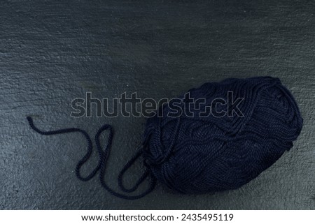 Knitting yarn for knitting on black background