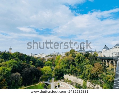 Luxembourg, a green oasis, harmonizes nature and history. Lush landscapes embrace historic charm, creating a picturesque haven in this enchanting European destination. Royalty-Free Stock Photo #2435535881