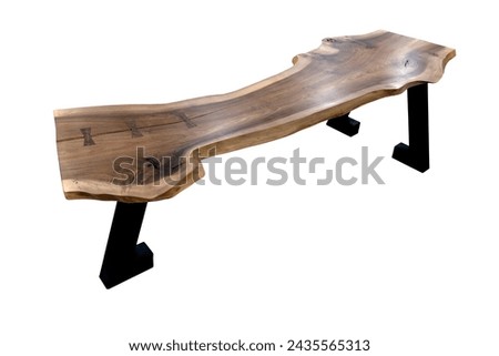 Modern live edge elm slab coffee table top on metal support isolated on white background