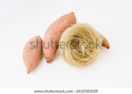 Various sweet potato vermicelli on monochrome background
