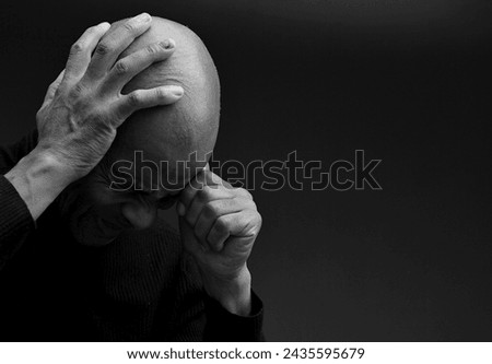 men in pain with headache praying to God in desperation with people stock image stock photo