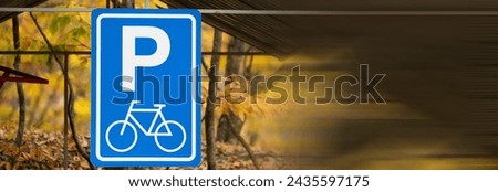 Place for parking bicycles in the forest under a canopy
