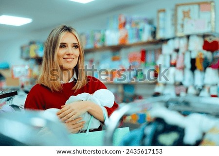 
Mother Holding Newborn on a Shopping Spree in a Store 
Mom and her infant going in a boutique together shopping for essentials 
