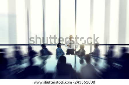 The leader of the business people giving a speech in a conference room. Royalty-Free Stock Photo #243561808
