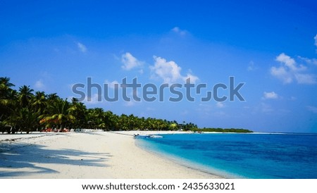 Blue lagoon sea and white sand beach, Bangaram island lakshadweep  Royalty-Free Stock Photo #2435633021
