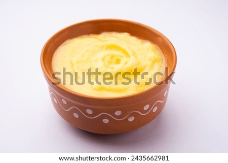 Pure Tup OR Desi Ghee also known as clarified liquid butter Royalty-Free Stock Photo #2435662981
