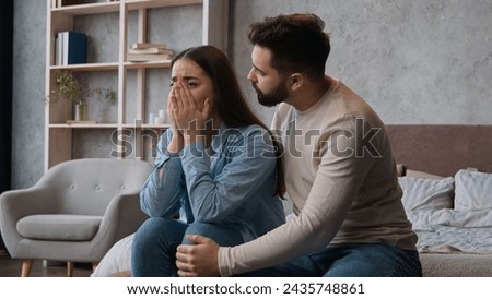 Couple quarrel family problem breakup misunderstanding conflict divorce Caucasian man husband guy calming crying sad woman wife girl feel guilty say sorry apologize ask forgiviness supporting at home Royalty-Free Stock Photo #2435748861