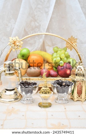 Vertical mode. Month of Ramadan. Giving the glimpse of Ramadan with dates and fruits. Overly exposed  Royalty-Free Stock Photo #2435749411
