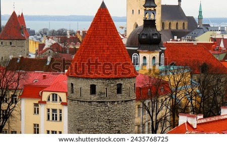 A medieval castle in the historical center of Tallinn. The Estonian architecture of antiquity. The fort is a defensive structure in the old town. Royalty-Free Stock Photo #2435768725