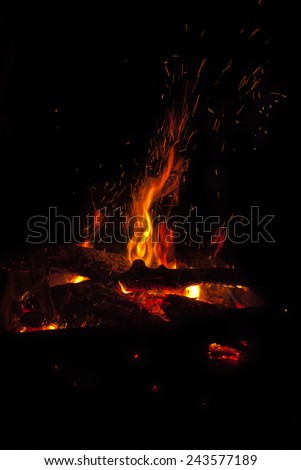 night campfire on a black background