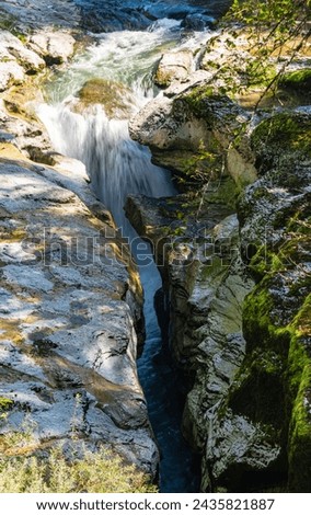 Waterfall, river Le Fier before the eponym gorges, with low shutter speed