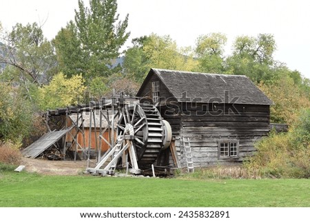 Old Water Mill.
A watermill is an engine that uses a water wheel or turbine to drive a mechanical process such as flour or lumber production, or metal shaping (rolling, grinding or wire drawing) Royalty-Free Stock Photo #2435832891