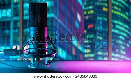 Recording microphone. Audio equipment. Microphone in studio inside skyscraper. Condenser mic for podcast recording. Microphone is mounted on tripod. Audio technology. Mike for audio announcer