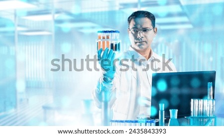 Doctor virologist. Man works in laboratory. Virologist holds test tubes with tests. Doctor at table with laptop and flasks. Lab technician in white coat. Male virologist stands in clinic building Royalty-Free Stock Photo #2435843393