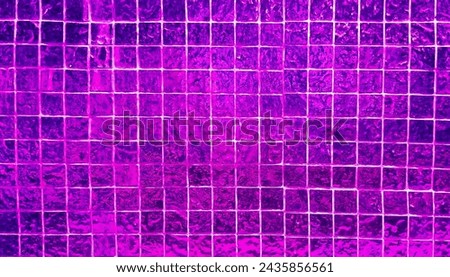 neon violet square mosaic tiles texture use as background in close up view. grungy glass tiles for decoration for futuristic, luxury, rich, elegant, abstract style concept.