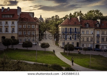 beautiful view of the city at sunset. It is worth seeing life on the streets in Warsaw in the summer at sunset Royalty-Free Stock Photo #2435884111